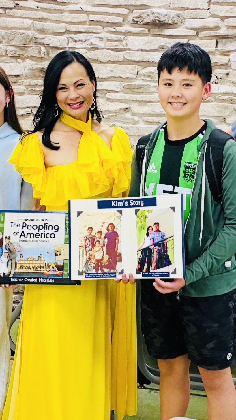 Kim with student holding TCM curriculum book