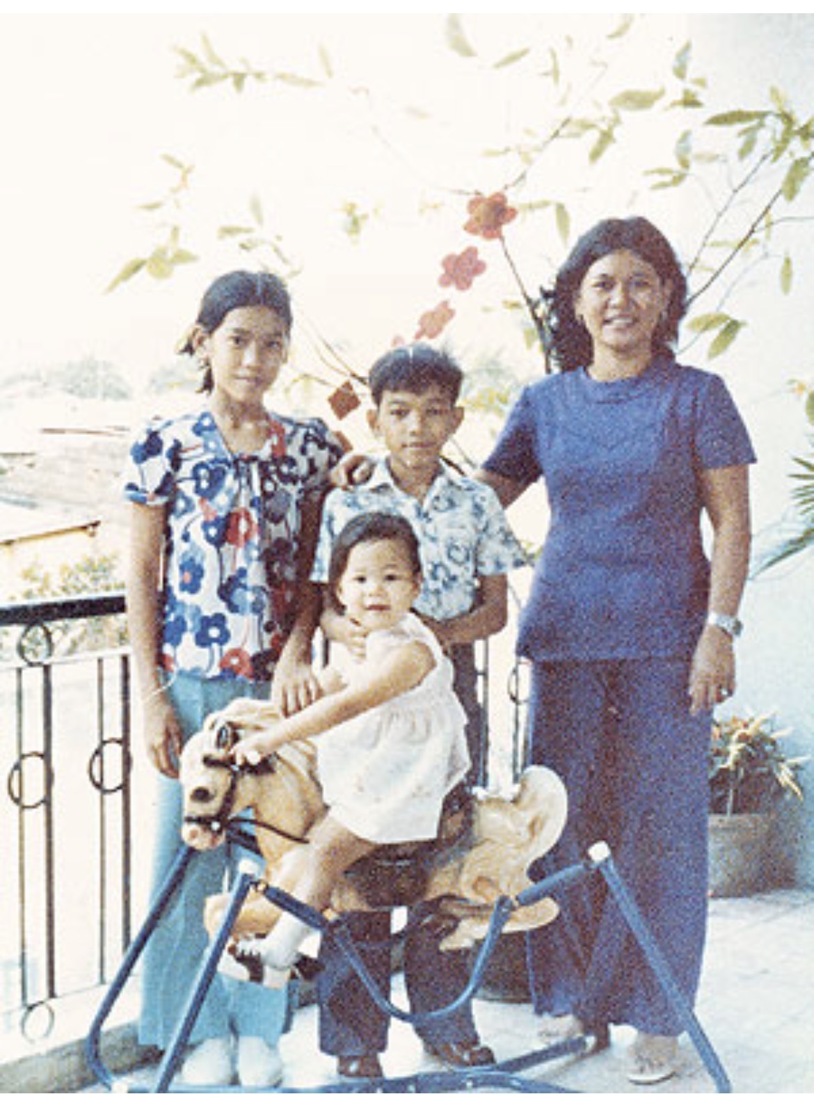 Young Kim as a toddler in Saigon with family